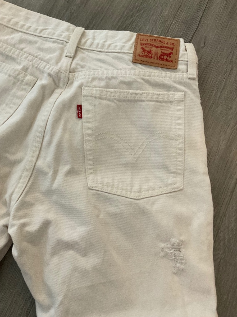 Levi’s Straight leg Ripped,  White Wash Woman’s  Distressed Jeans